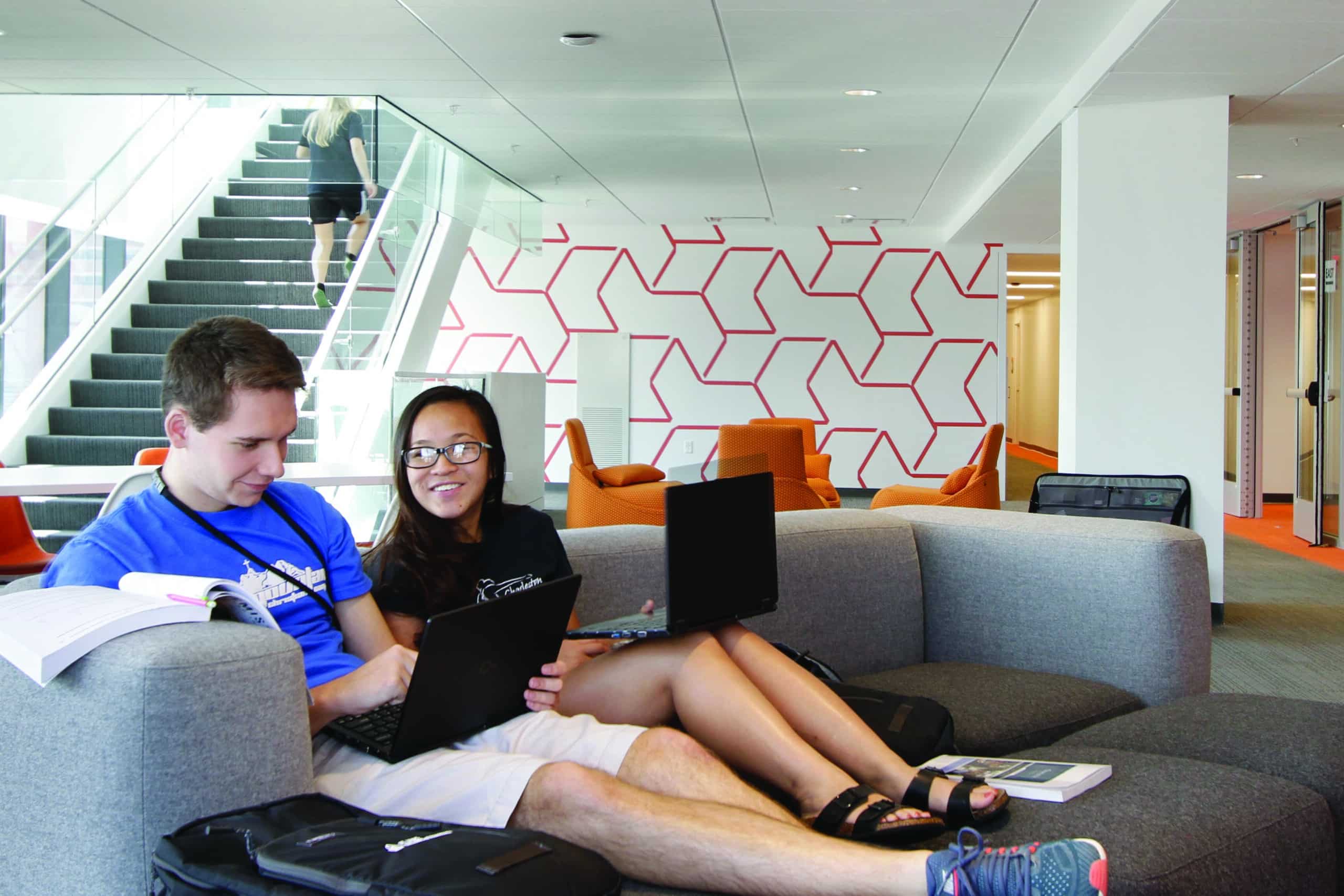 two students studyin the North Res. Hall common area