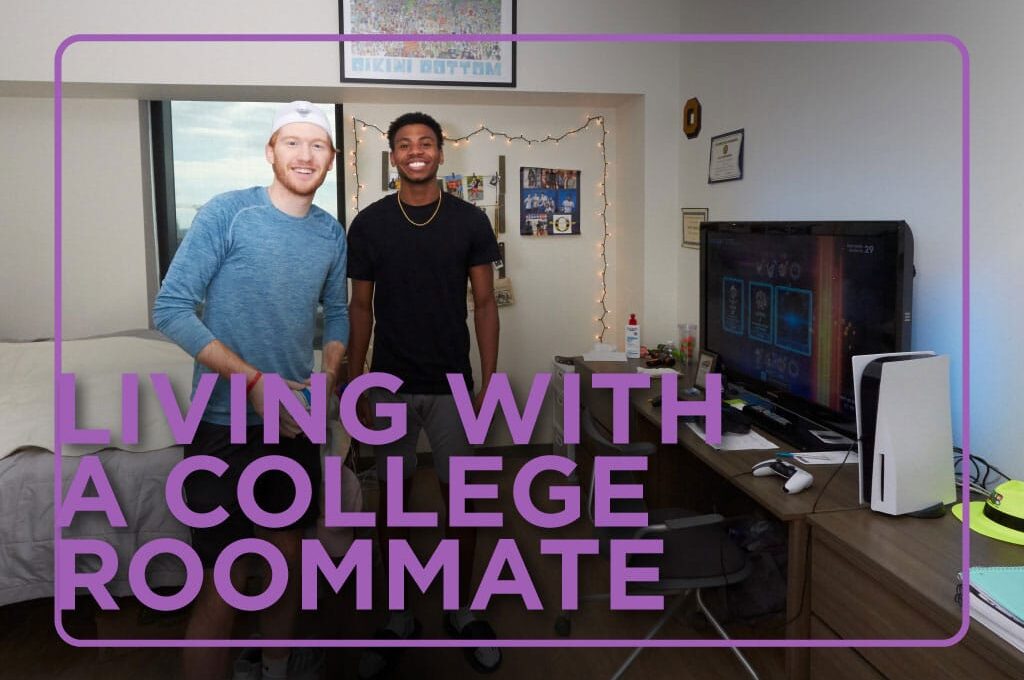 Two male roommates smile in dorm room within North Residence Hall