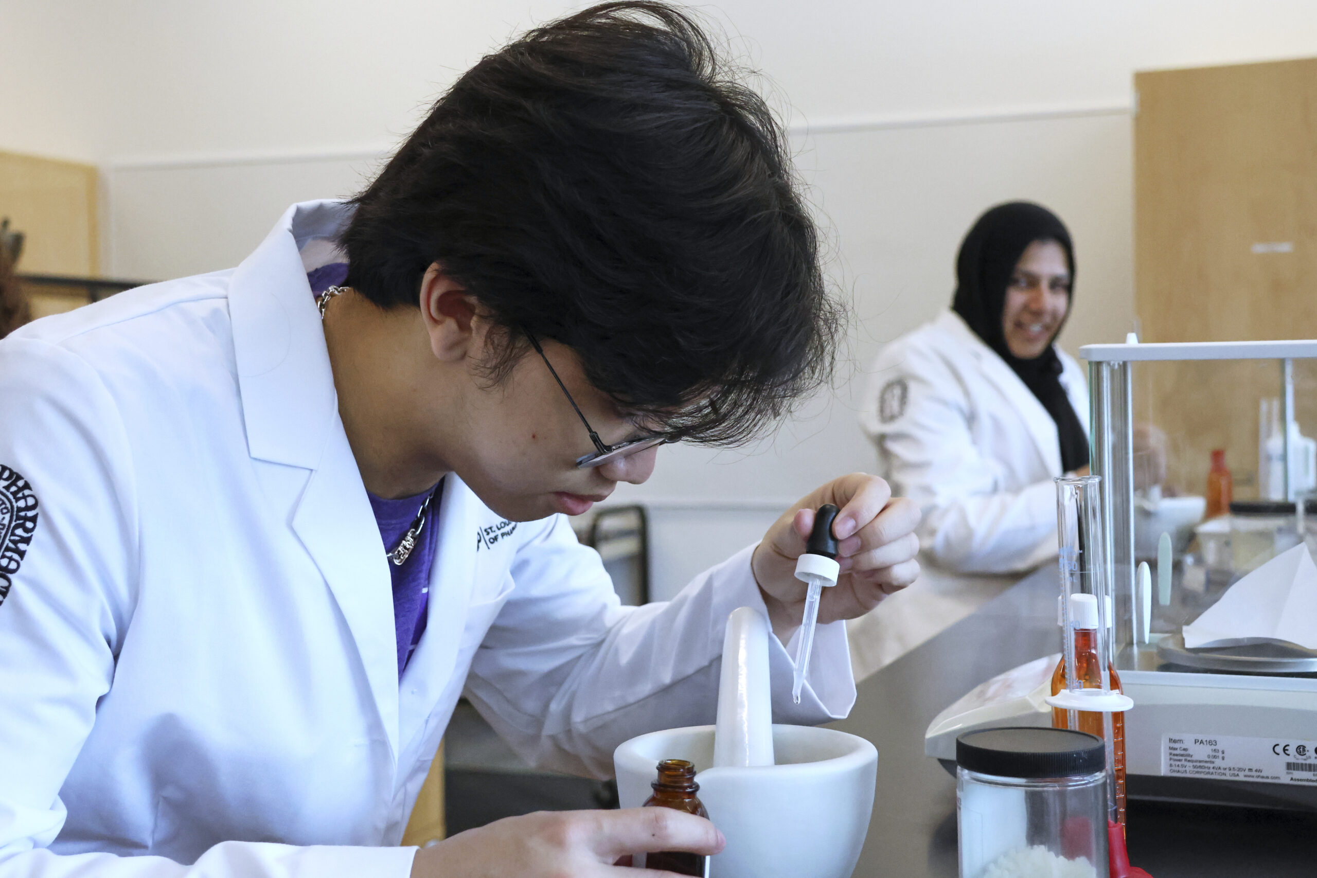 Student working in pharmaceutics lab