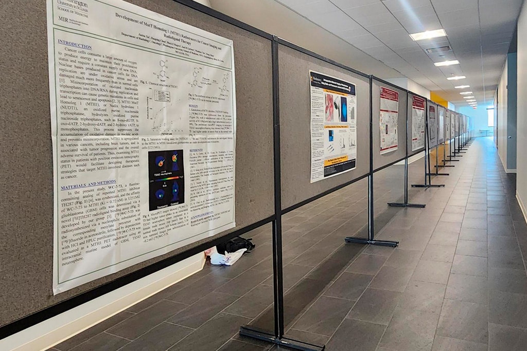 Poster presentation setup in hallway of ARB at UHSP